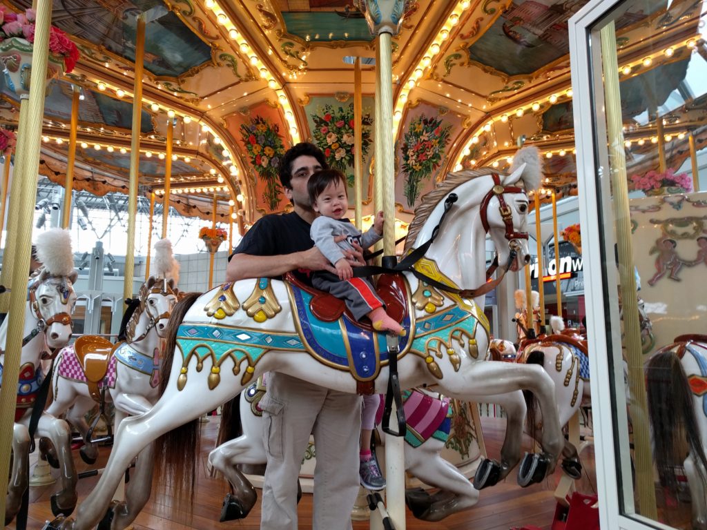 Sam's First Carousel Ride