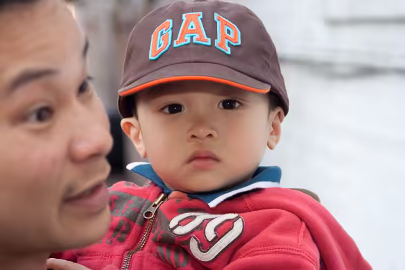 Nam stares in fear at the photographer
