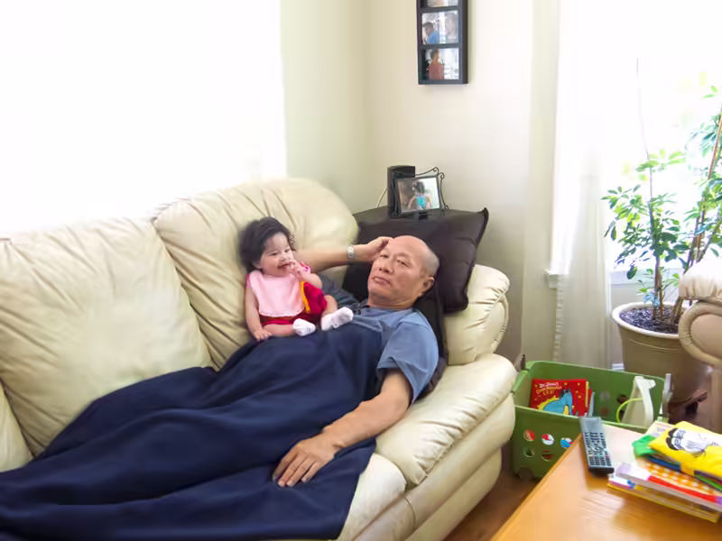 Scarlett Sitting on Grandpa