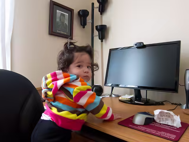 Scarlett about to use Mommy’s Computer