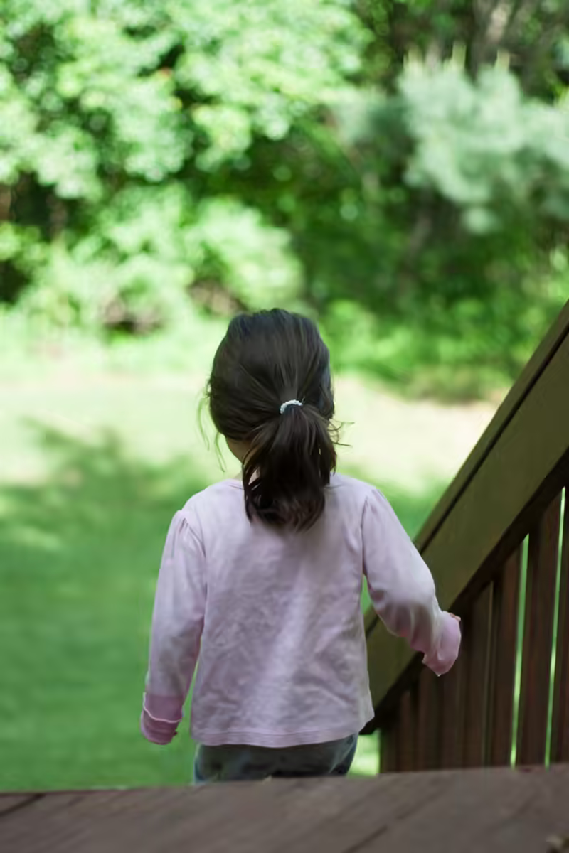 Scarlett plays in the yard-2 - web