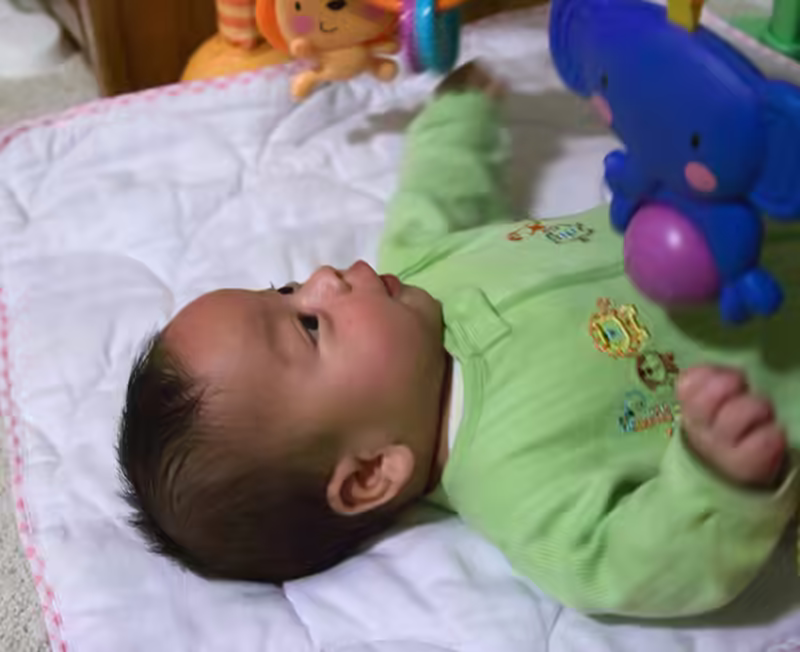 Sam in baby gym