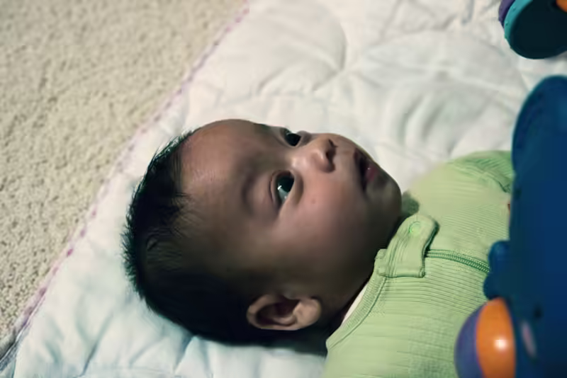 Sam in baby gym