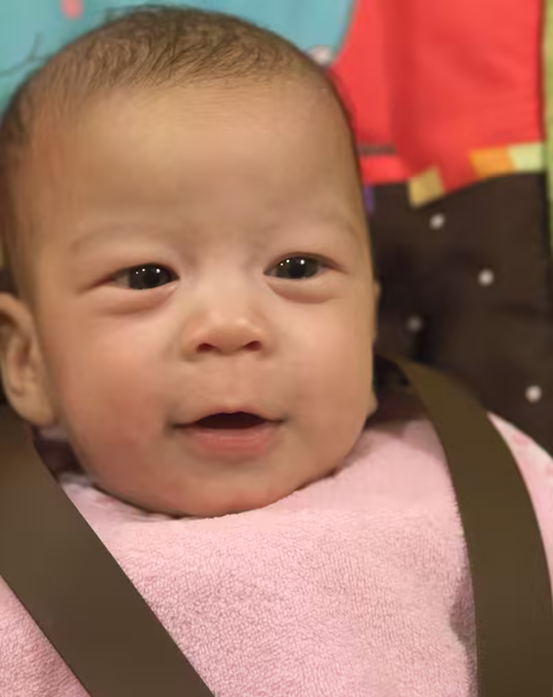 Stella in her high chair