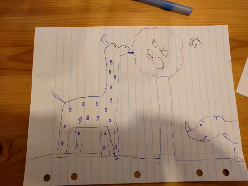 Scarlett (who added a bird and some apples to the drawing) thought I’d drawn a dinosaur and a dragon. At least, that was her first guess. She got it right on the second try.