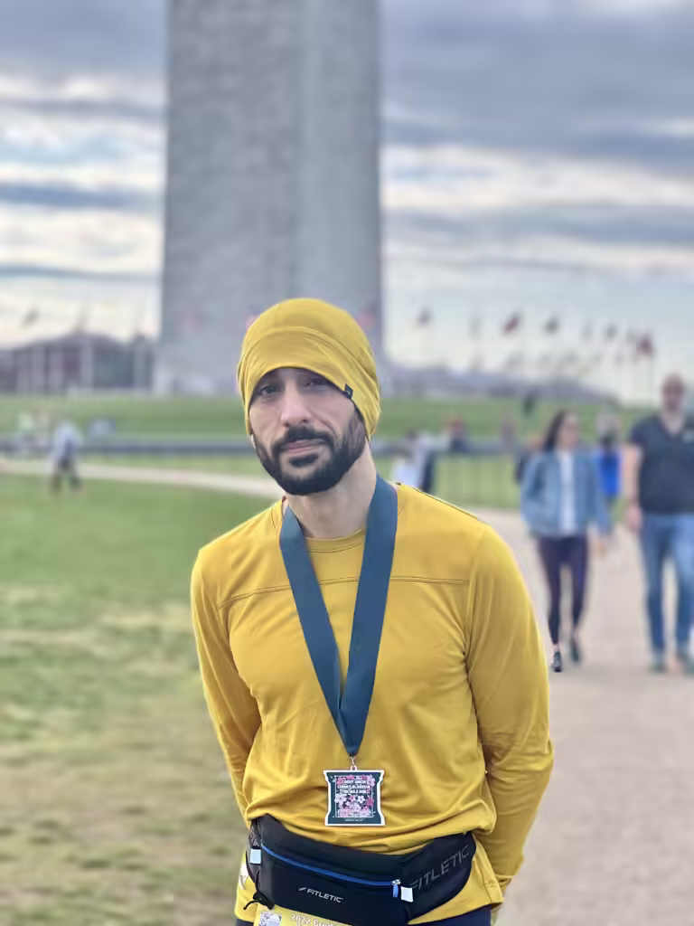 Me with medal in front of Washinton Monument (Taken by Mom)