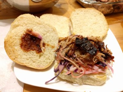 Smoked Pulled Pork Shoulder Sandwhiches with home-made coleslaw and some Trader Joe Kansas Style BBQ Sauce.