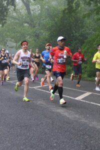 many runners running in Prospect Park